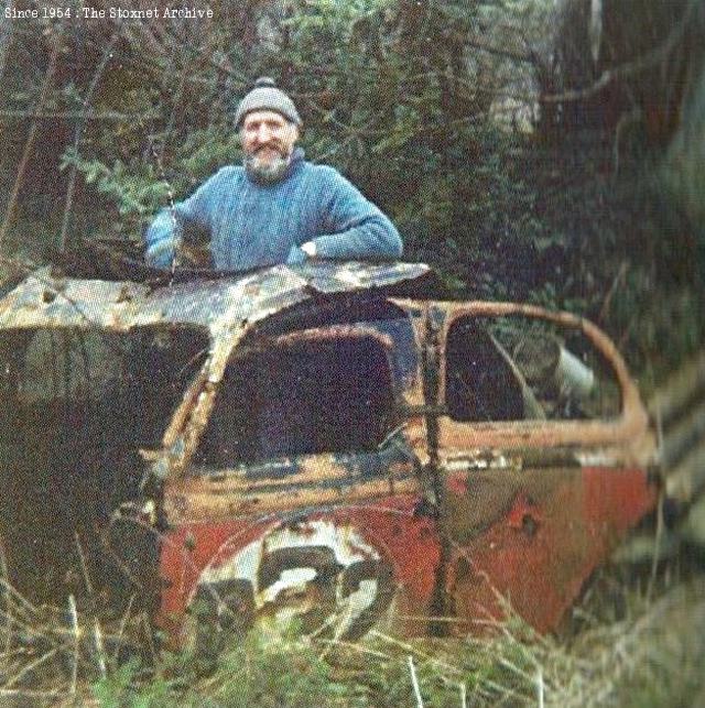 With the remains of the stock car. (From his autobiography)