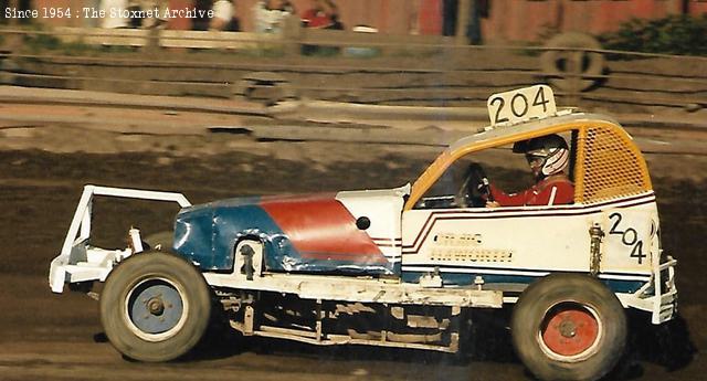 Crewe 1985. Allan explains - Following my broken hand debacle at Bradford, the wonderful Craig Haworth asked if I'd like to use his car at Crewe of all places. I was just as bad on shale. Only damage being a couple of bent track rods, a puncture, and the first scratch on Arthur Gibson's new car, as John Lund helped me out of the way on the bottom bend. Gibbo got between me and the fence. There ended my stock car racing career.